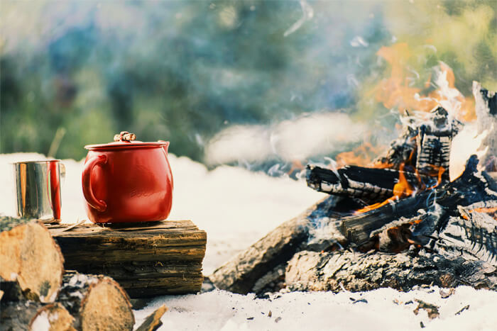 Coffee pot over a winter campfire