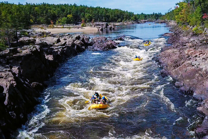 Two rafts negotiating white water on the Ottawa River