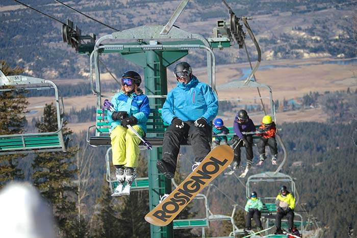People on chairlift at Fairmont Hot Springs Resort
