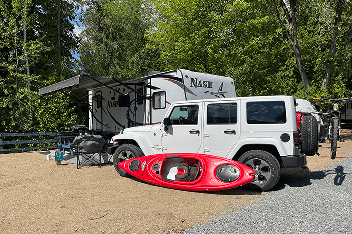 Trailer parked in campsite at Mara Lake RV