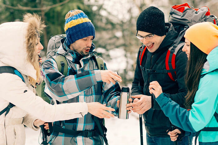 Winter-hikers-enjoying-hot-coffee-from-a-flask.jpg Winter-hikers-enjoying-hot-coffee-from-a-flask.jpg