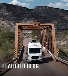Man driving an RV in the Rockies