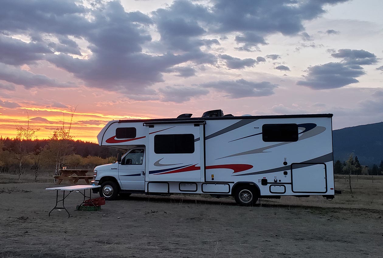 CanaDream MHA Maxi Motorhome with mountains and lake