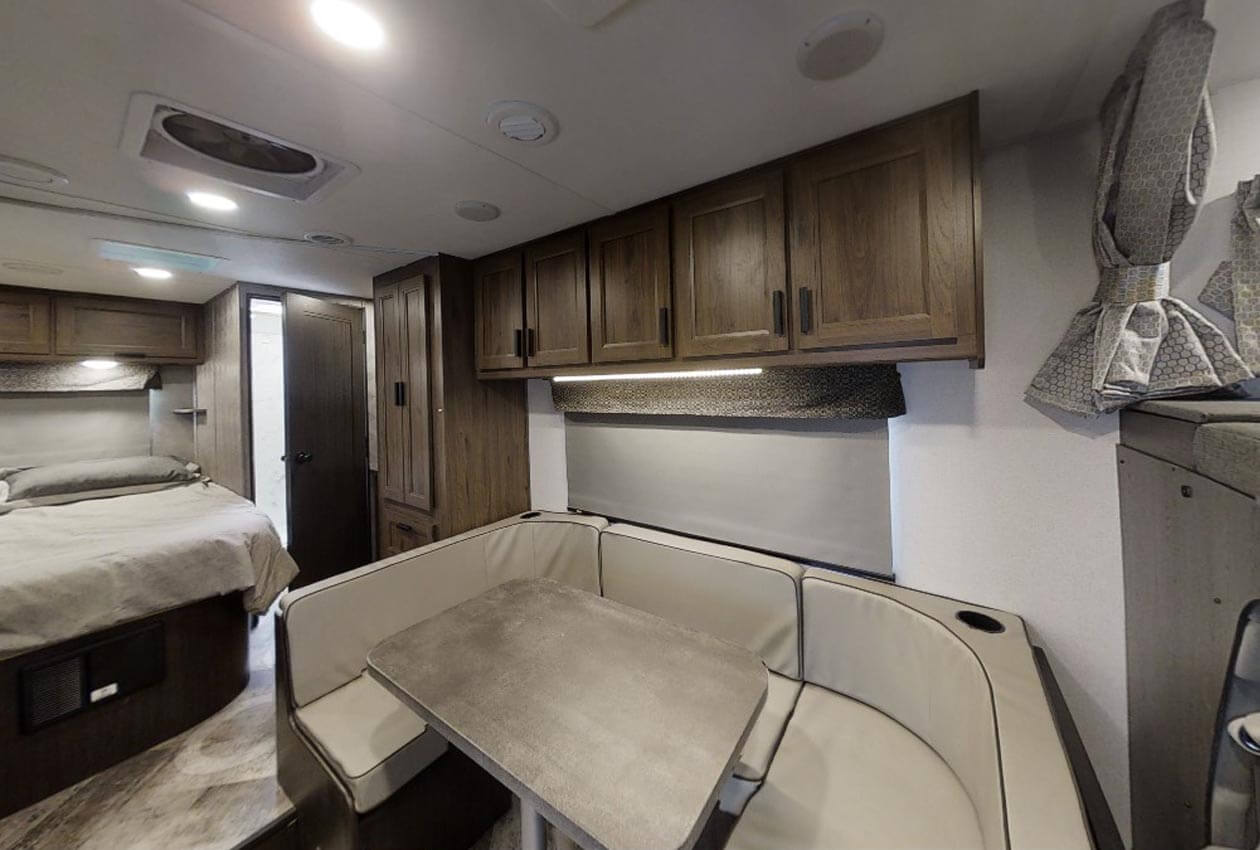 CanaDream Compact RV dinette and rear bed