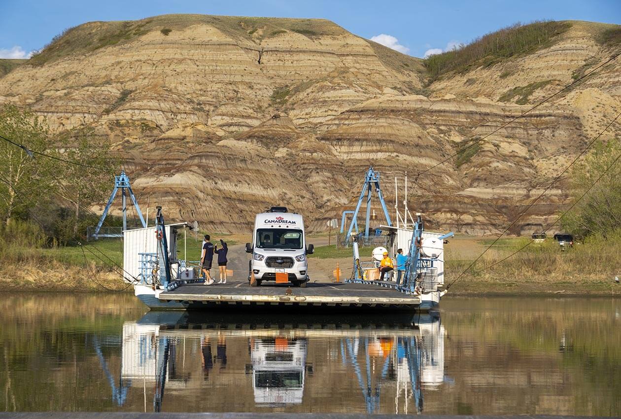 CanaDream Deluxe Van Camper on Bleriot Ferry near Drumheller