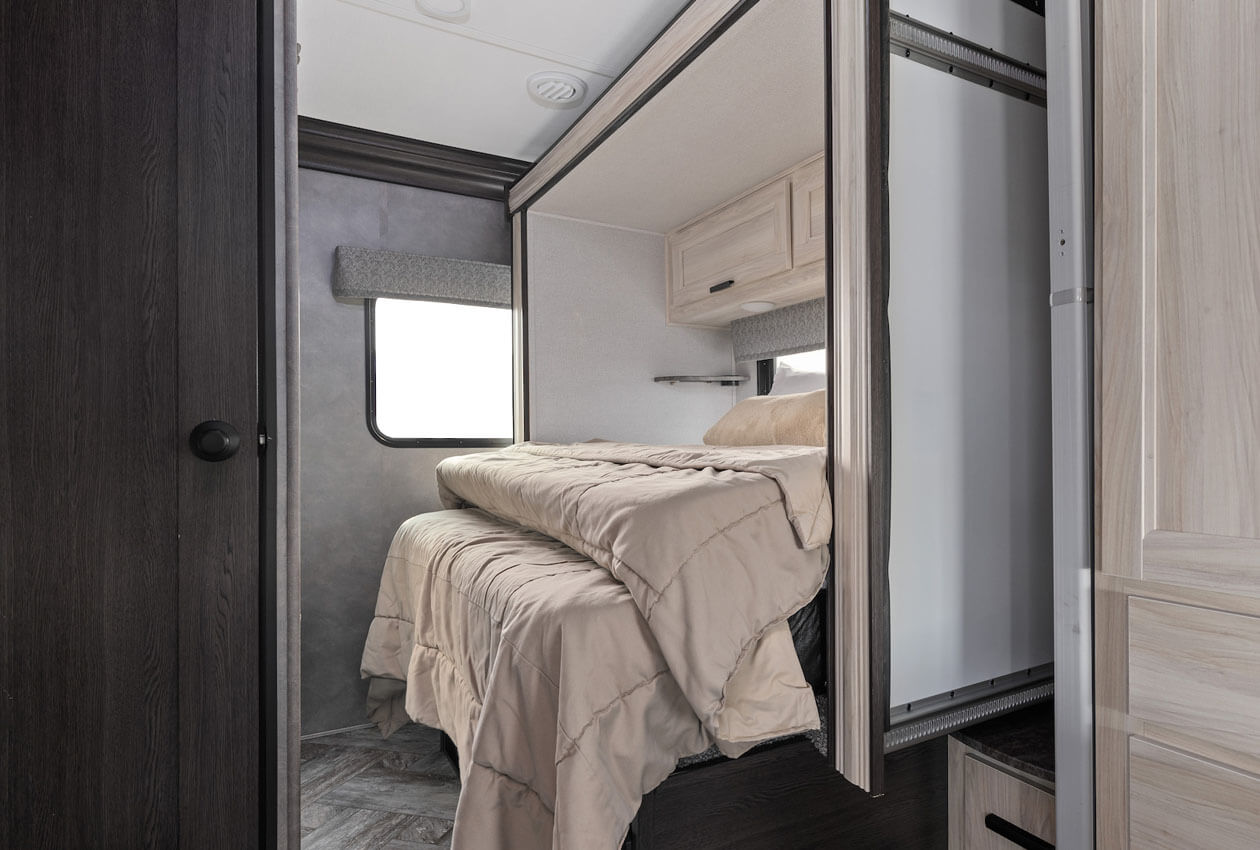 Rear Queen Bed with slide in for Travel