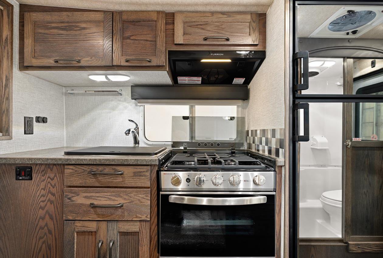 Kitchen with oven in CanaDream Truck and Camper TCA