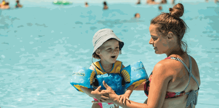 Lady and child in swimming pool