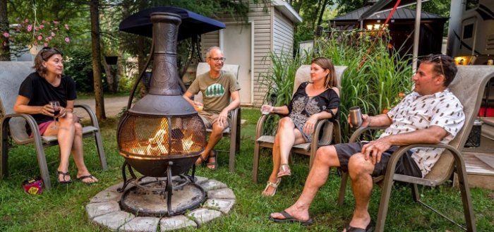 People sitting around a campfire